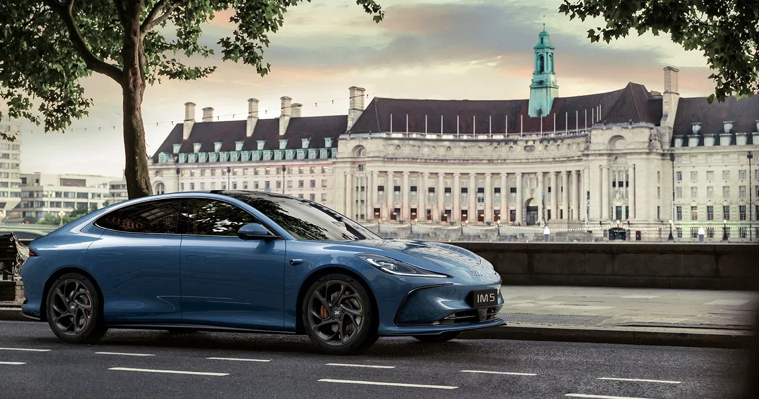 IM5 electric sedan on a city street